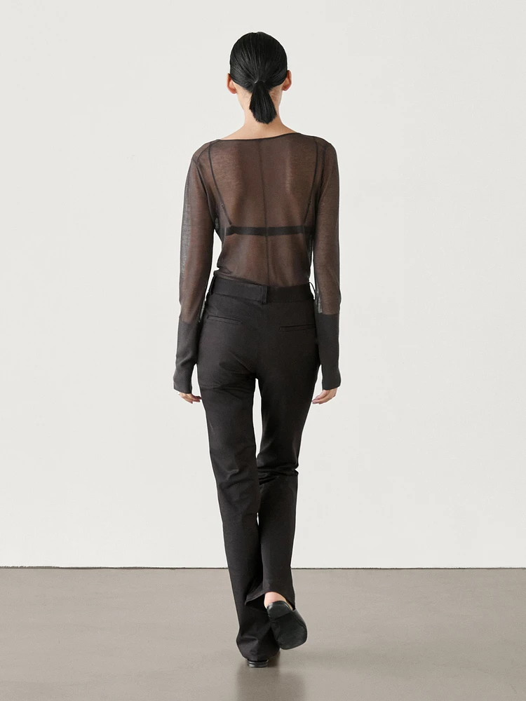 Pantalon slim flare taille basse