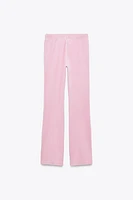 TEXT VELVET PANTS