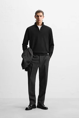 100% WOOL QUARTER ZIP SWEATER