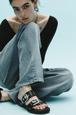 FLAT BUCKLED SANDALS