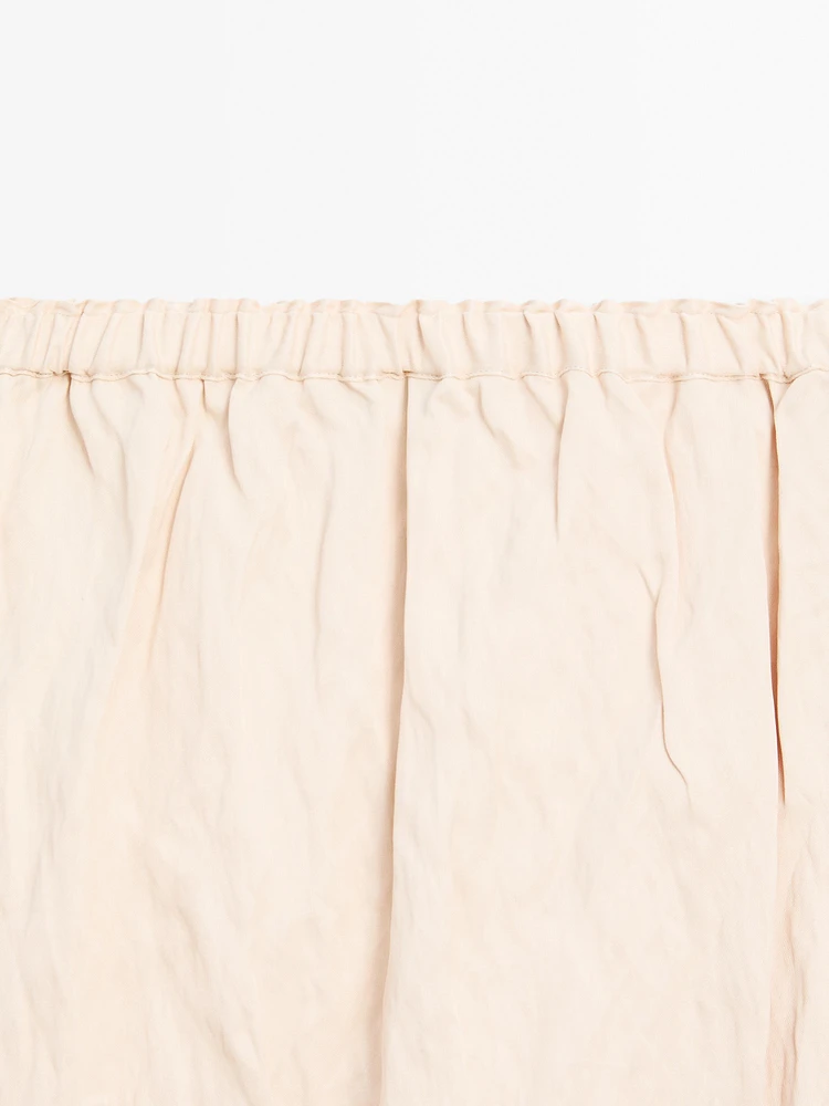 Jupe midi fluide à dentelle