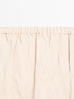 Jupe midi fluide à dentelle