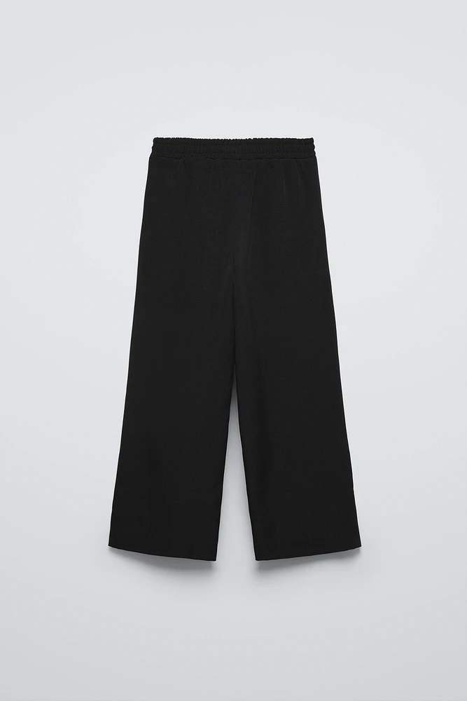 EMBROIDERED BOW WIDE LEG PANTS