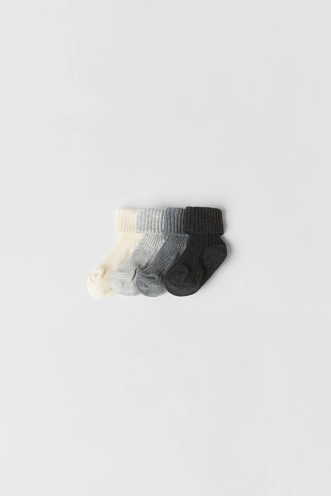 LOT DE QUATRE CHAUSSETTES COLORÉES