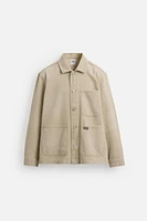 VESTE DÉLAVÉE À ÉCLABOUSSURES