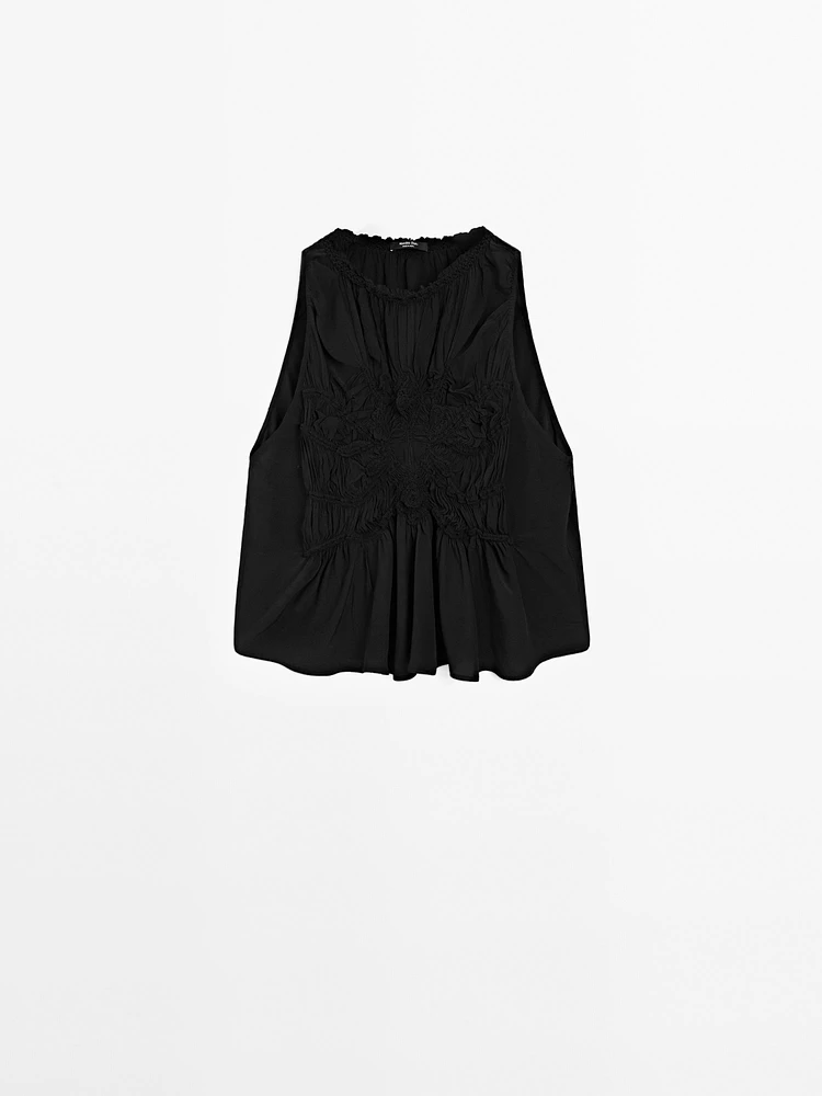 Flowing halter top with gathered detail