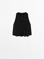 Flowing halter top with gathered detail