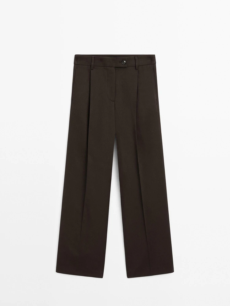 Wide-leg pleated cotton blend trousers