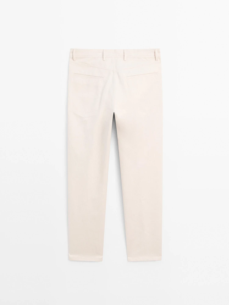 Cotton blend tapered fit denim trousers