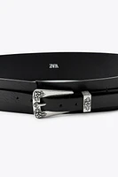 CEINTURE EN CUIR AVEC PIÈCES MÉTALLIQUES