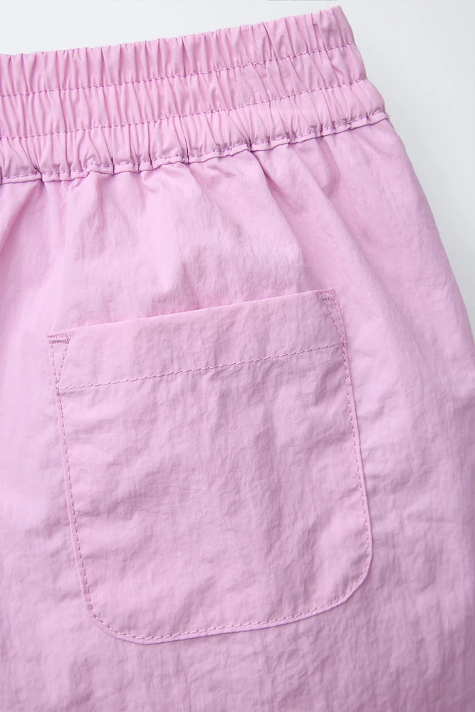 TECHNICAL PLEATED SKORT