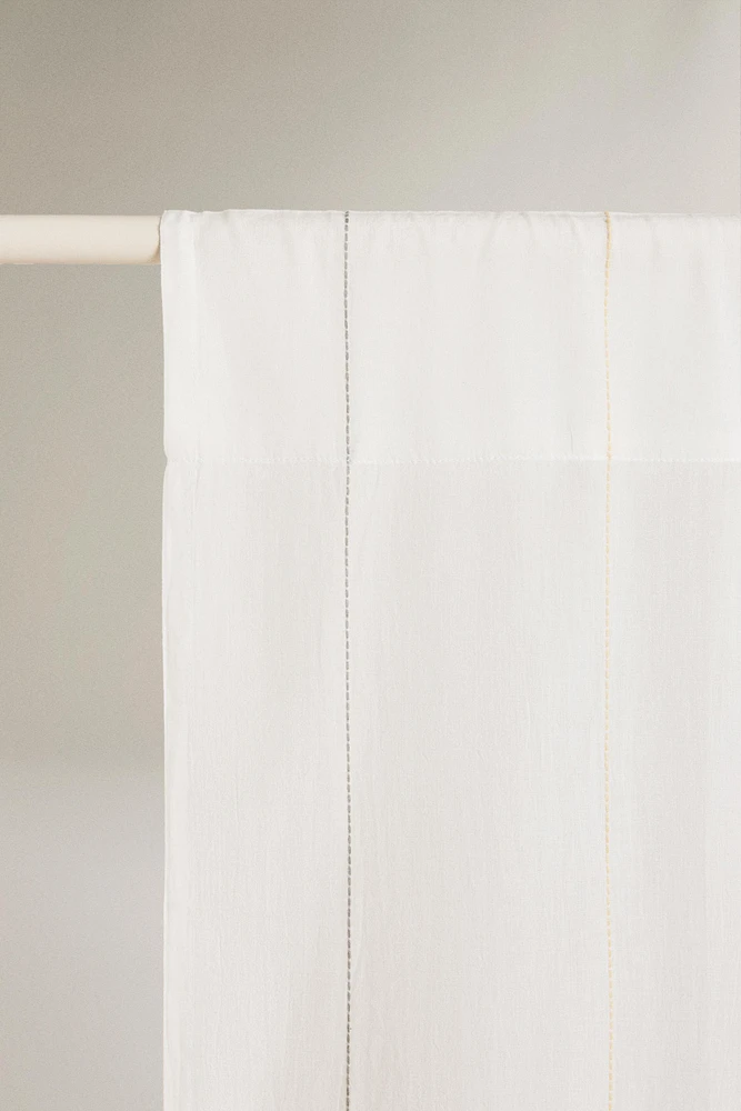 LOW OPACITY TASSEL CURTAIN