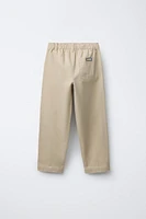 PANTALON COUPE CAROTTE À POCHES