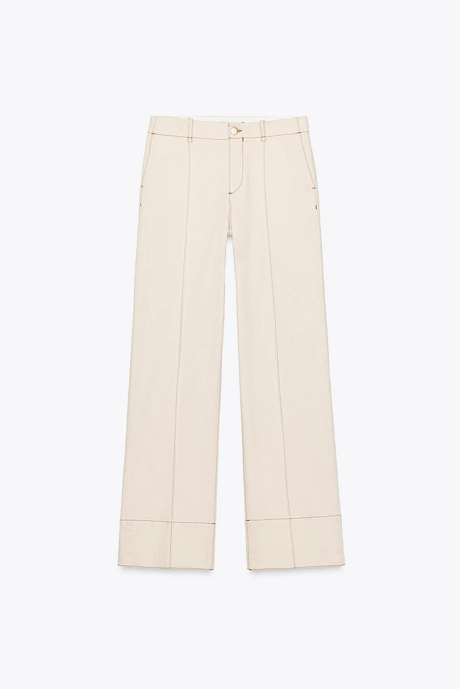 PANTALON BOOTCUT SURPIQÛRES
