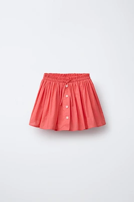 BUTTON SKORT
