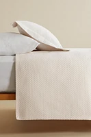 BEDSPREAD WITH POLKA DOT DESIGN
