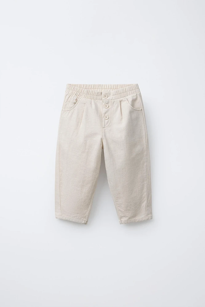 PANTALON BAGGY À BOUTONS EN LIN