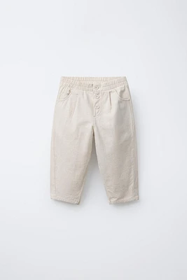 PANTALON BAGGY À BOUTONS EN LIN