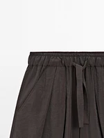Voluminous silk blend trousers