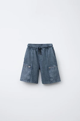 BERMUDA EFFET DÉLAVÉ AVEC POCHES À ZIP