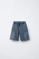 WASHED EFFECT ZIP POCKET SHORTS
