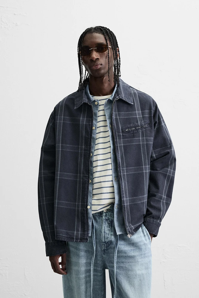 VESTE À CARREAUX ZIPPÉE