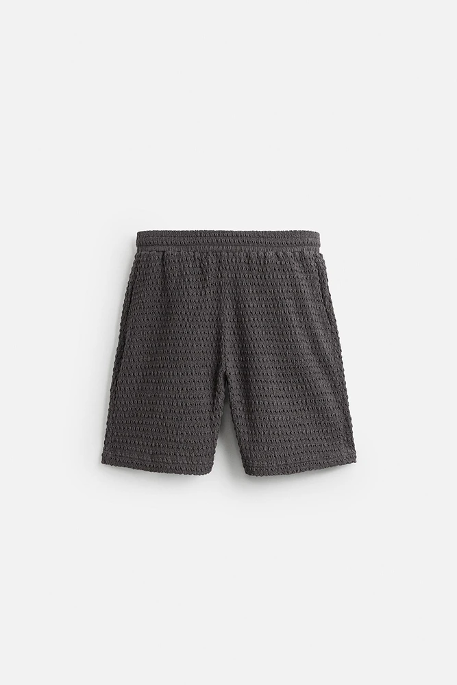 IRREGULAR TEXTURED BERMUDA SHORTS