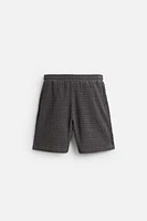 IRREGULAR TEXTURED BERMUDA SHORTS