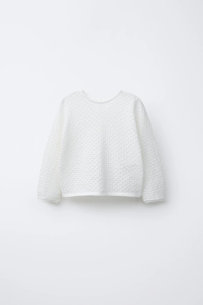OPEN KNIT SWEATER