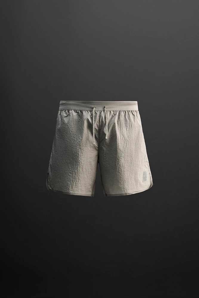STRUCTURED RUNNING SHORTS
