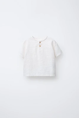 T-SHIRT COL TUNISIEN TEXTURE COMBINÉE