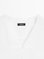 Flowing linen blend blouse with V-neckline