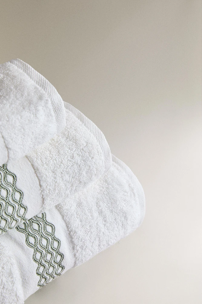 BATH TOWEL WITH EMBROIDERED BORDER
