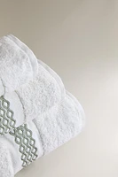 BATH TOWEL WITH EMBROIDERED BORDER