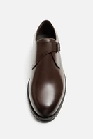 CHAUSSURES EN CUIR À BOUCLE