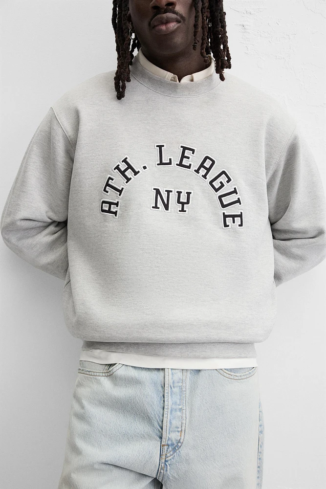 TEXT PATCH SWEATSHIRT