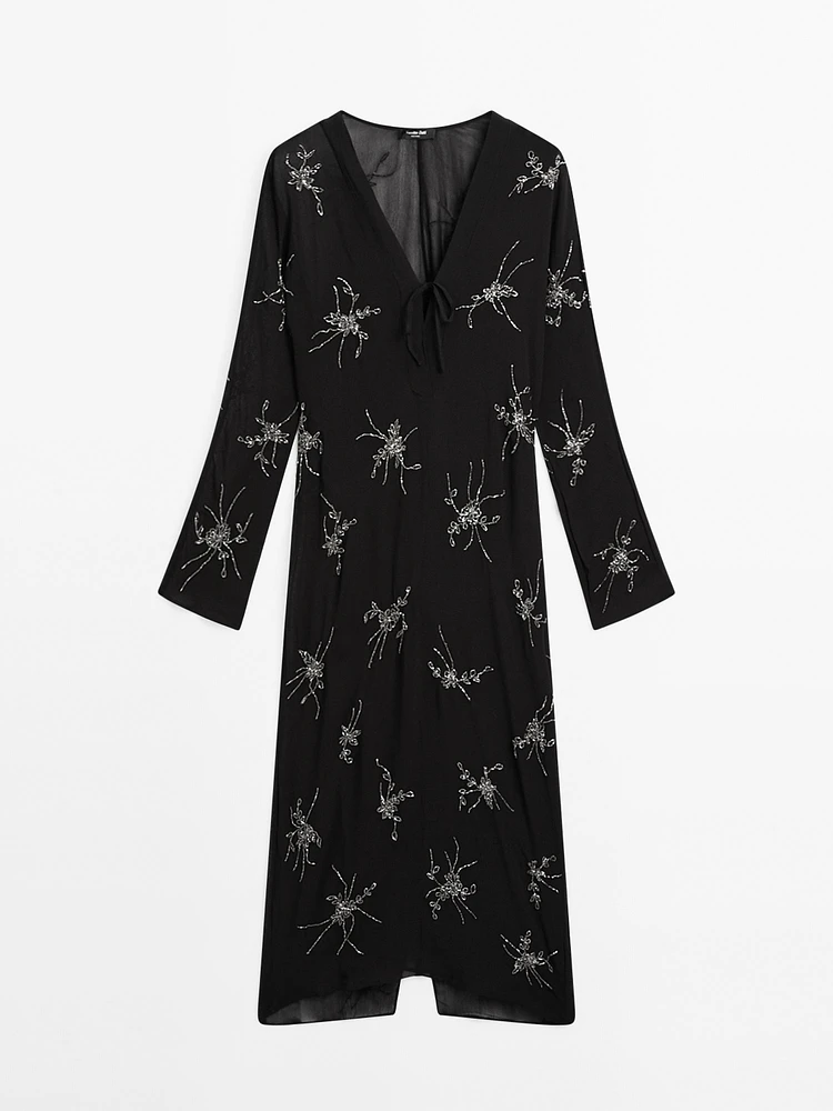 Robe midi fluide avec broderies
