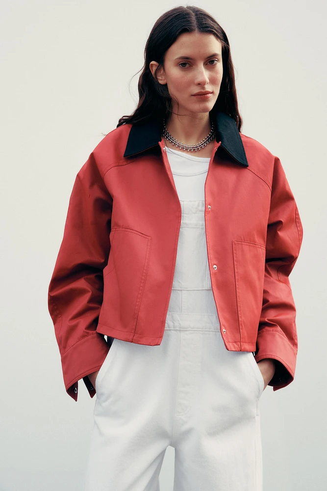 VESTE CIRÉE À COL EN MATIÈRES VARIÉES
