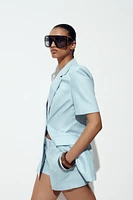MID-RISE LINEN BERMUDA SHORTS