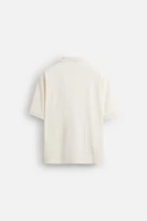 POLO À TEXTURE AVEC ZIP