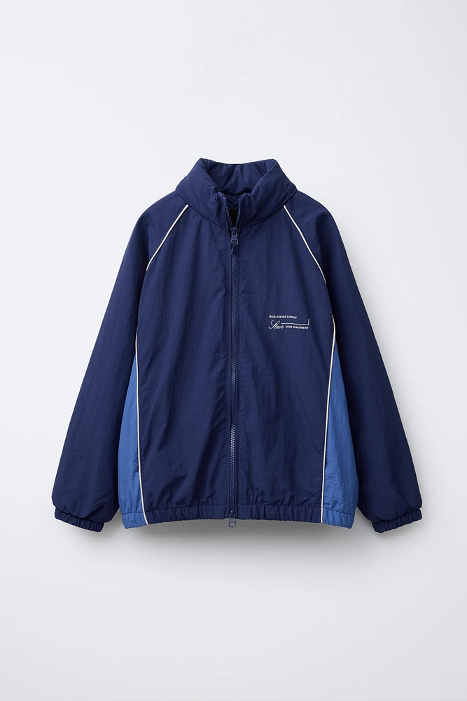 WATER REPELLENT TEXT PRINT HOODED RAINCOAT