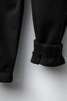 EMBROIDERED TEXT JOGGER PANTS