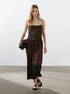 Long flowing pleated skirt