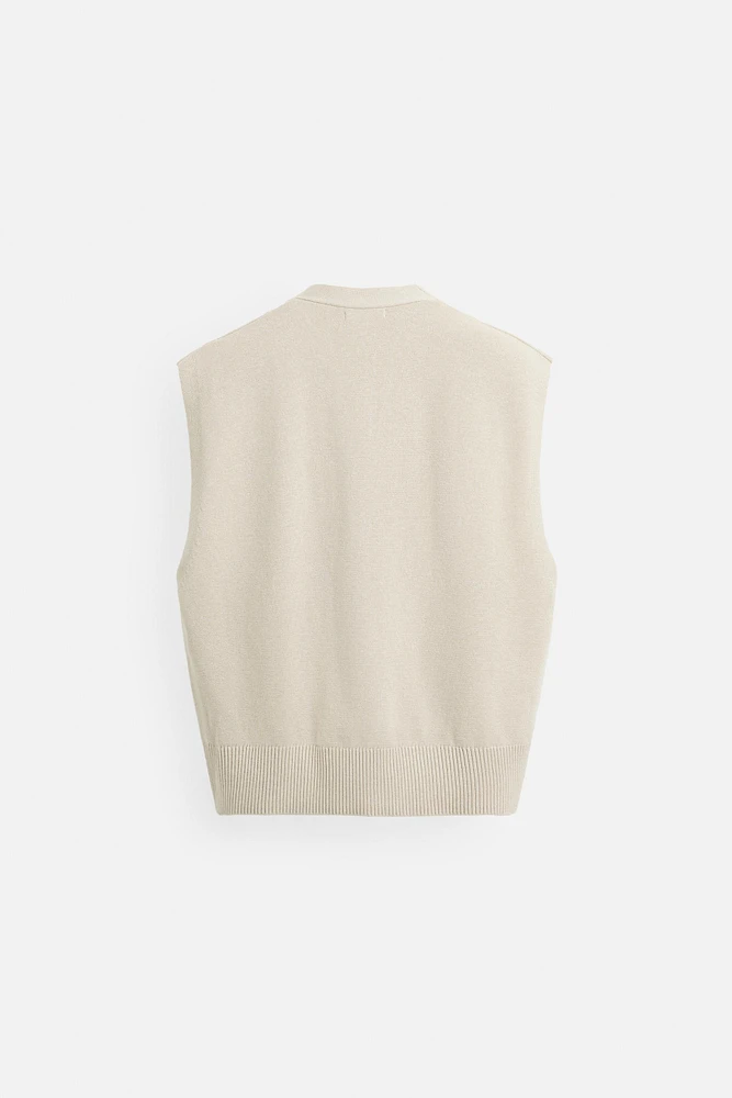 GILET EN MAILLE AVEC RUBAN