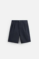 BERMUDA RELAXED FIT À PLIS