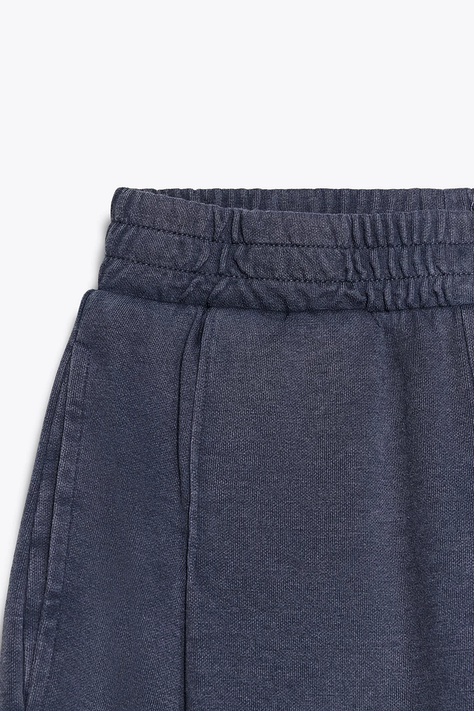 WASHED PLEATED PANTS