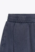 WASHED PLEATED PANTS