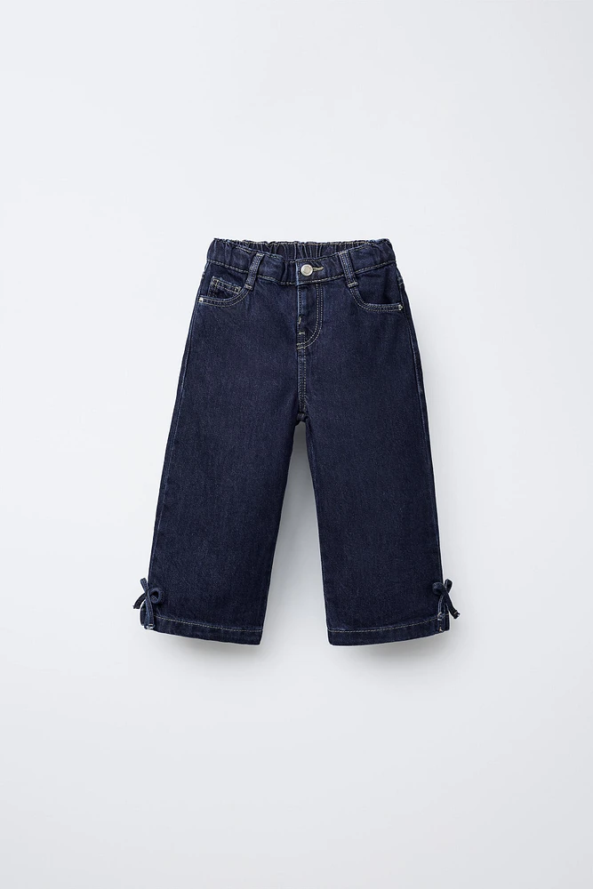 JUPE-CULOTTE EN JEAN À NŒUDS