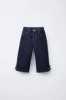 JUPE-CULOTTE EN JEAN À NŒUDS