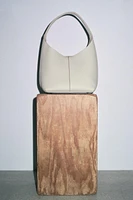 GRAINED LEATHER BUCKET BAG